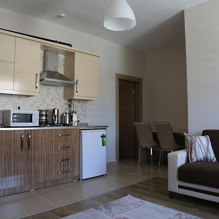 ウルギュップ Ozsoy Apartアパートホテル 部屋 写真
