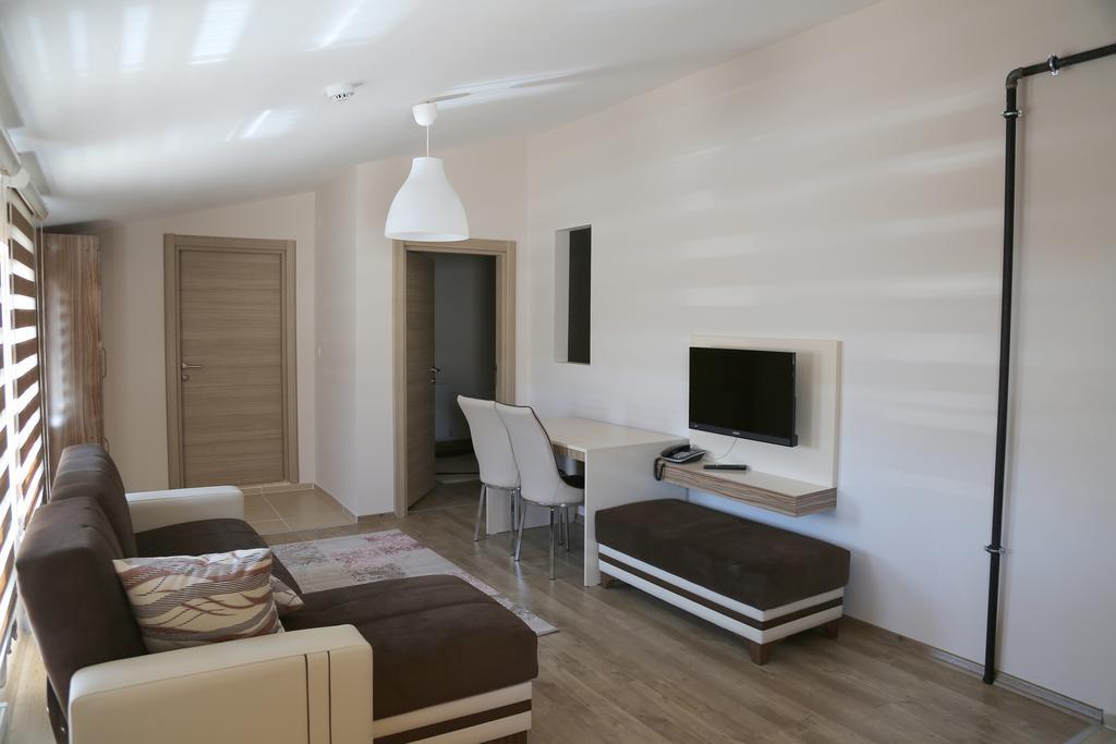 ウルギュップ Ozsoy Apartアパートホテル 部屋 写真
