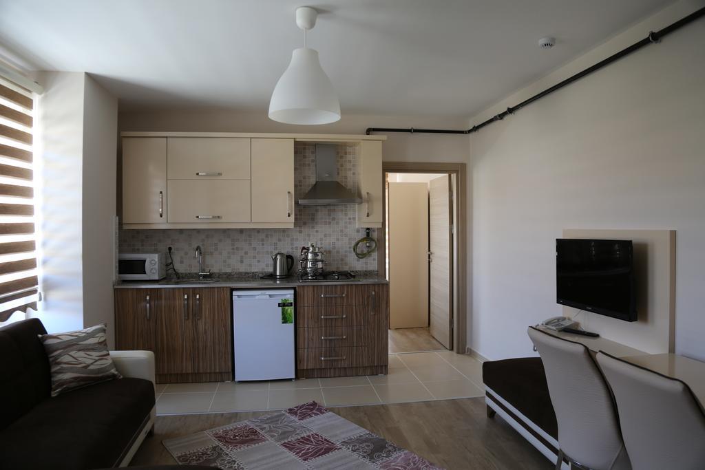 ウルギュップ Ozsoy Apartアパートホテル 部屋 写真
