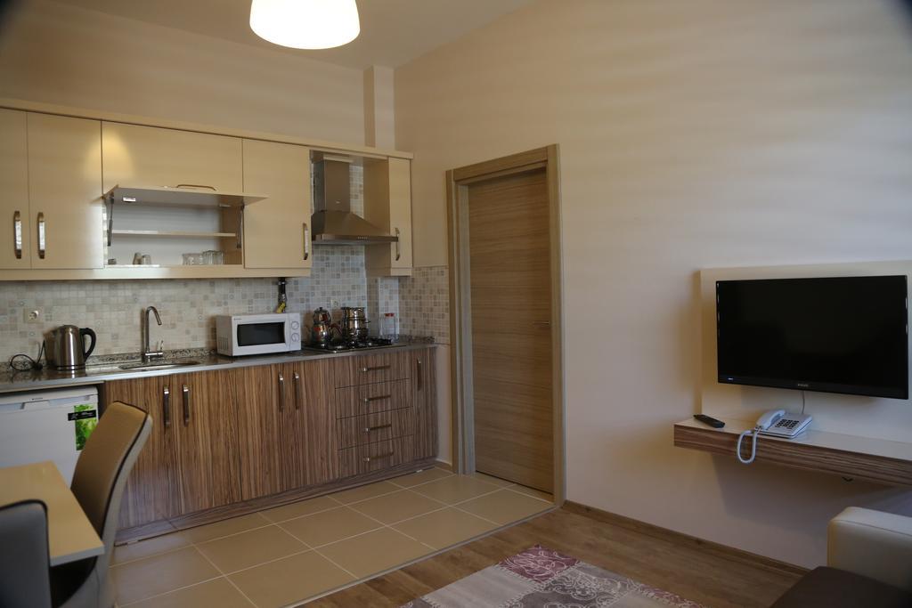 ウルギュップ Ozsoy Apartアパートホテル 部屋 写真
