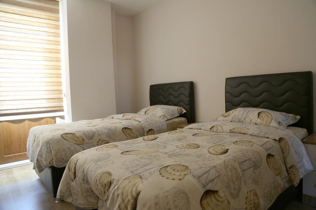 ウルギュップ Ozsoy Apartアパートホテル 部屋 写真