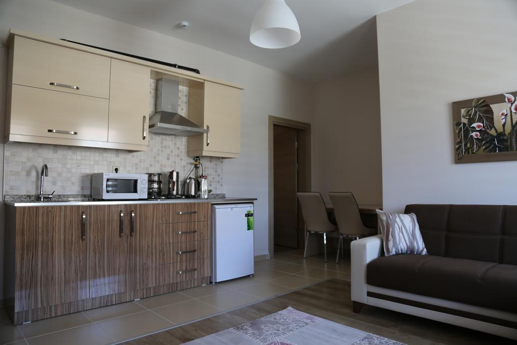 ウルギュップ Ozsoy Apartアパートホテル 部屋 写真